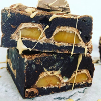 Livi Express Thick chocolate brownie squares layered with caramel and sweet drizzle in Livingston. 